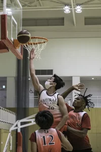 Tokyo Top 30 Showcase player puts ball in basket